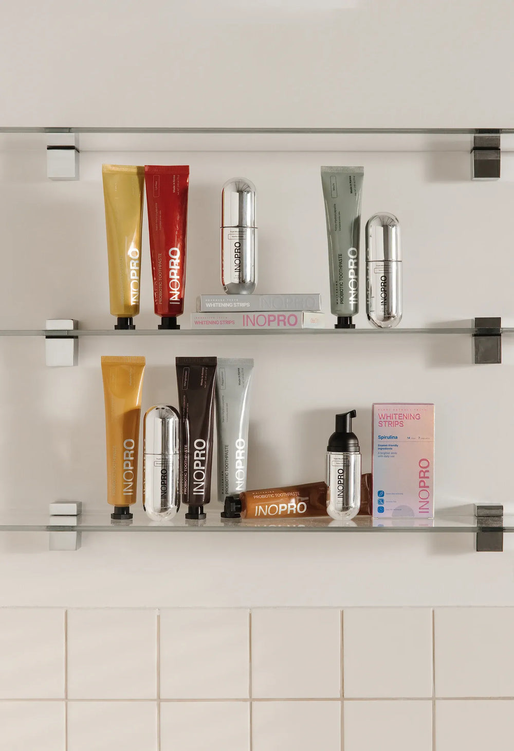 INOPRO oral-care products arranged on a bathroom shelf
