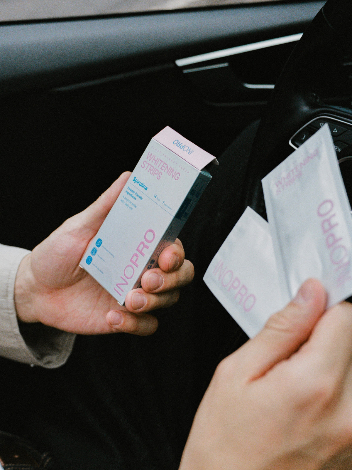 INOPRO whitening strips held on the go